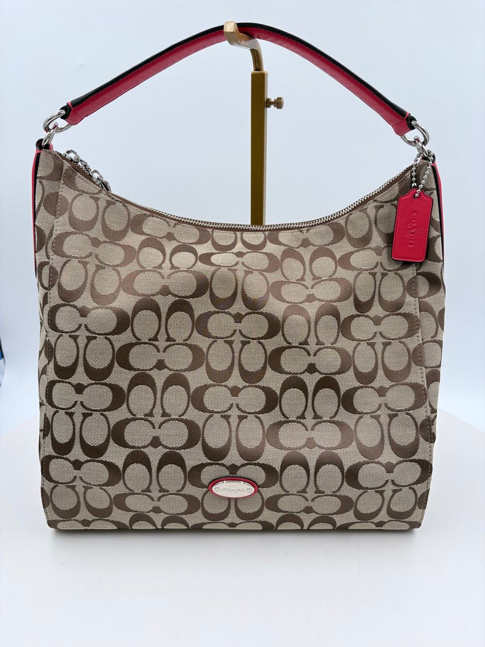 Authenticated Monogram Coach shoulder bag